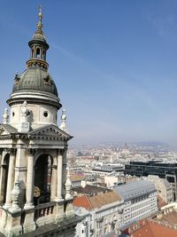 Buildings in city against sky