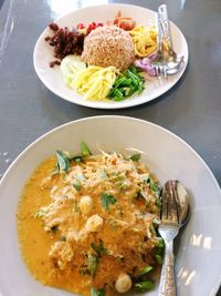 High angle view of food served on table