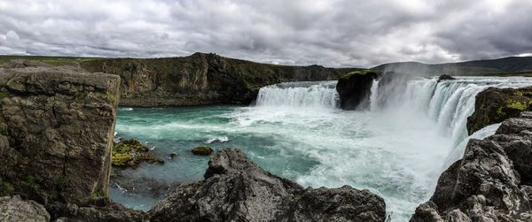 Scenic view of waterfall in iceland