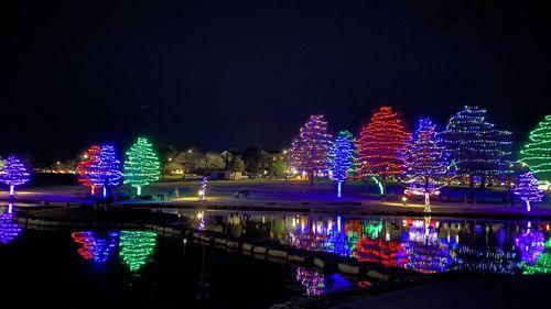 Illuminated modern building in city at night