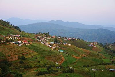 High angle view of landscape and mountains against sky
