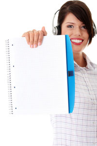 Portrait of a smiling young woman over white background