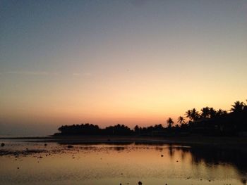 Scenic view of sunset over river