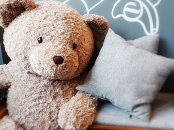 Close-up of stuffed toy on bed