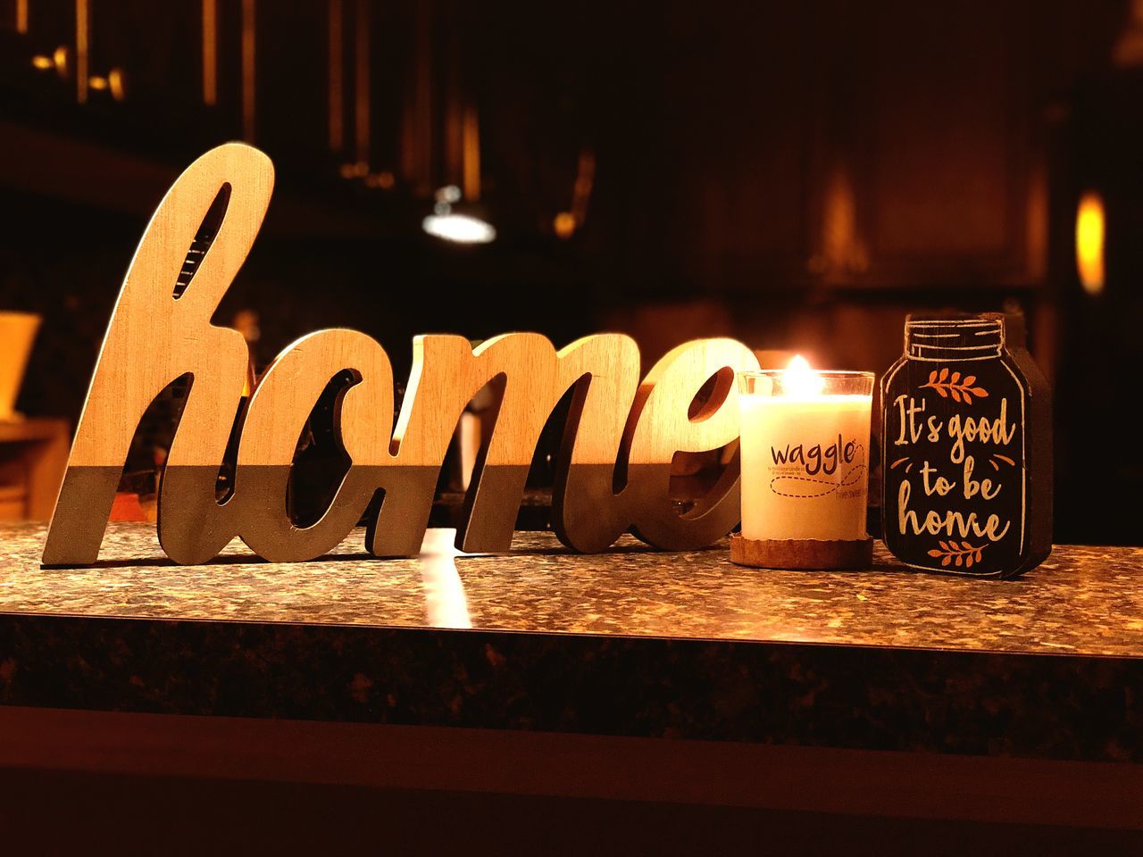 text, illuminated, western script, communication, no people, burning, close-up, fire, flame, lighting equipment, indoors, night, heat - temperature, candle, focus on foreground, fire - natural phenomenon, capital letter, glowing, nature, table