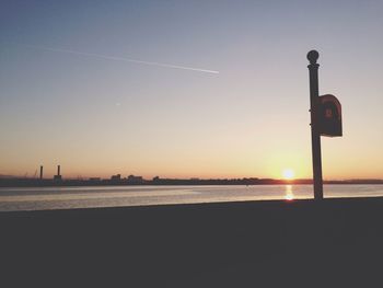 Scenic view of sea at sunset