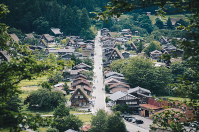 High angle view of townscape and trees in town