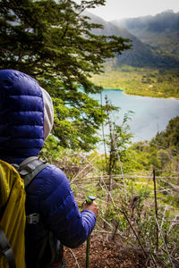 Rear view of man in forest