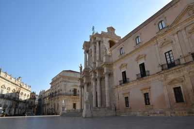 Low angle view of buildings against sky