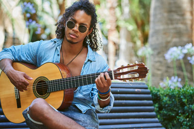 Young man playing guitar