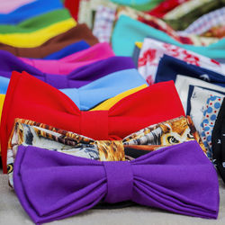 Close-up of multi colored bow tie at shop for sale