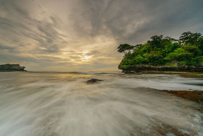 Scenic view of sea against sky during sunset