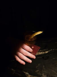 Close-up of hand holding ice cream