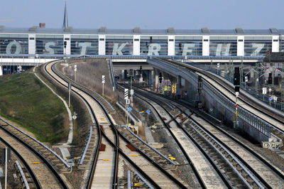 High angle view of railroad tracks in city against sky