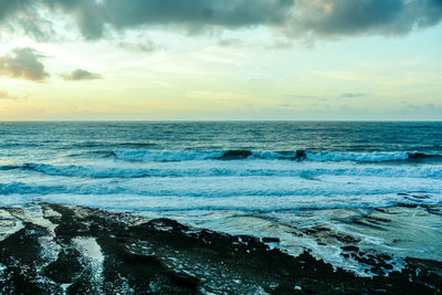 Scenic view of sea against sky during sunset
