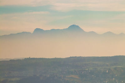 Scenic view of mountains against sky during sunset