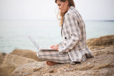 Side view of senior man on beach