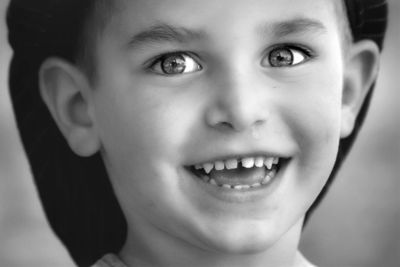 Close-up portrait of smiling boy