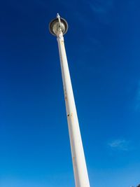 Low angle view of tower against clear blue sky