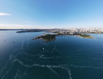 Scenic view of sea against blue sky