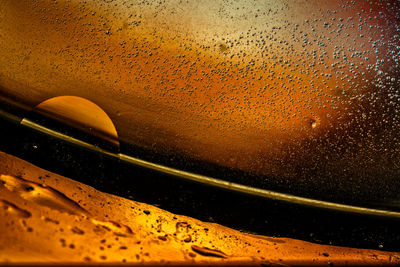 Close-up of water drops on glass