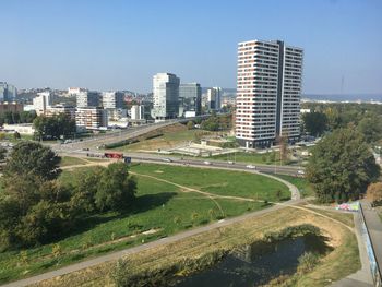 High angle view of buildings in city against sky