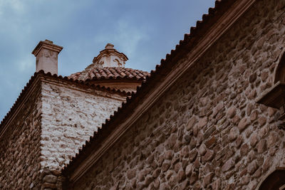 Low angle view of old building against sky