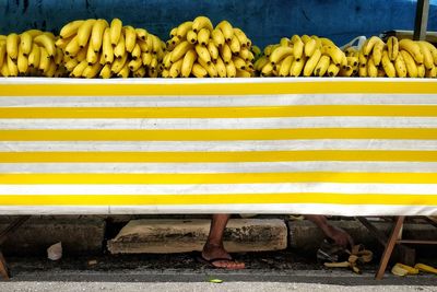 High angle view of yellow fruits for sale at market