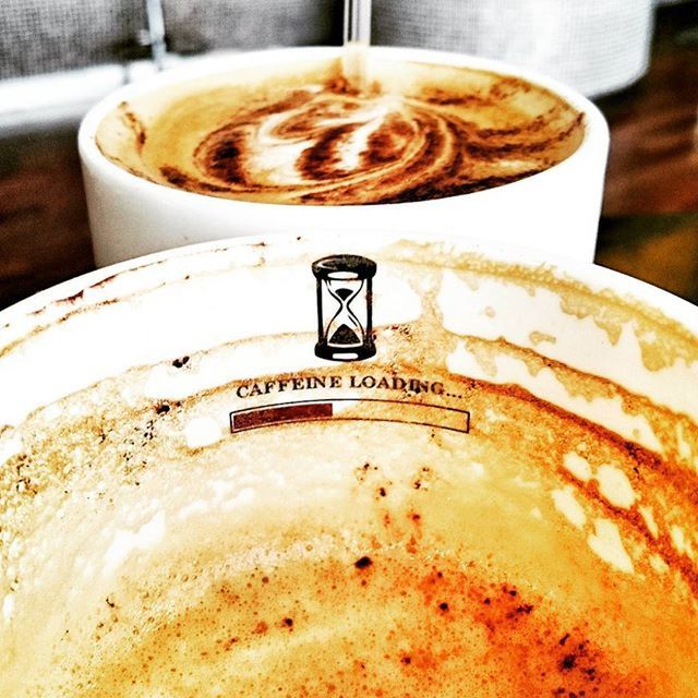 indoors, text, food and drink, close-up, communication, table, western script, drink, still life, focus on foreground, coffee cup, refreshment, coffee - drink, metal, no people, saucer, frothy drink, day, cafe, selective focus