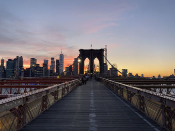 Manhattan view from brooklyn bridge at sunset