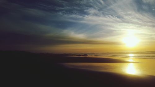 Scenic view of sea at sunset