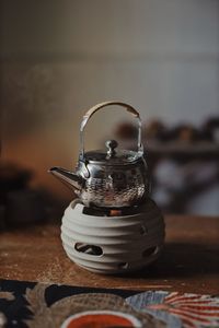 Close-up of teapot on table