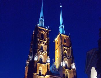 Low angle view of church against blue sky