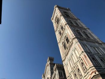 Low angle view of buildings against clear sky