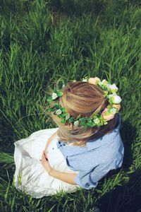 High angle view of girl on grassy field