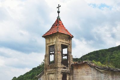 Low angle view of traditional building against sky. old aboundoned church . 