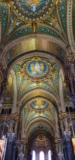 Low angle view of ornate ceiling in building