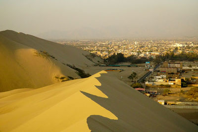 High angle view of road passing through city