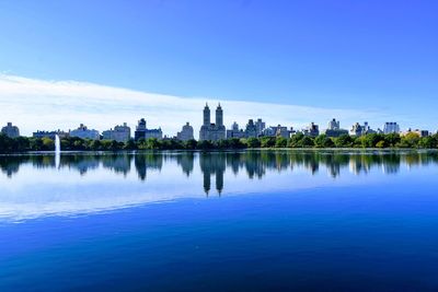 Reflection of buildings in lake