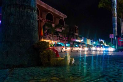 Boats in lake at night