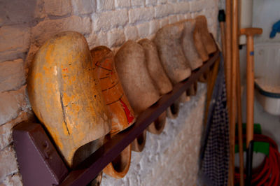 Close-up of meat hanging on wall