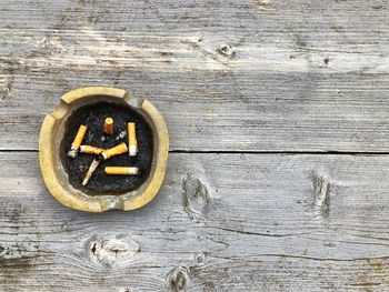 High angle view of cigarette on table