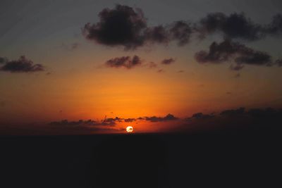 Scenic view of dramatic sky during sunset