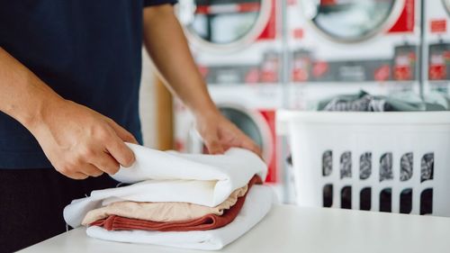 Midsection of woman working on table