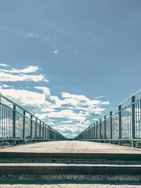 View of bridge against cloudy sky