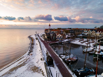 Panoramic view of buildings against sky during winter