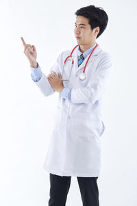 Full length of a man standing on white background