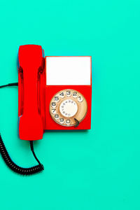 Telephone phone against blue background