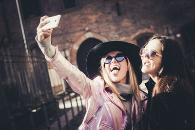 Portrait of two young women posing