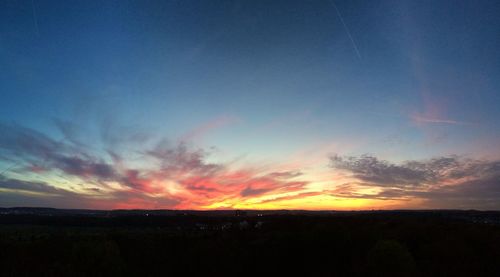 Scenic view of landscape at sunset